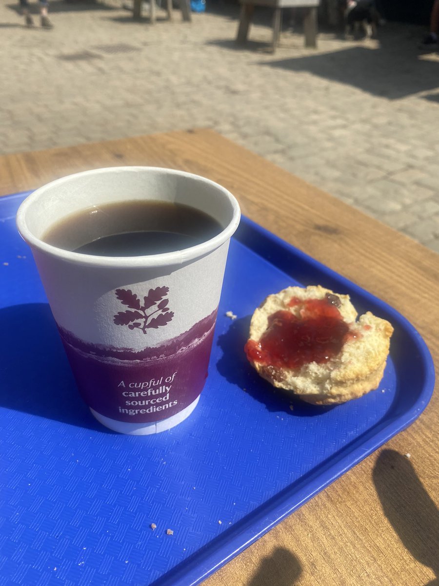Coffee and a fruit scone with jam. No cream so no Devon/Cornwall favouritism shown.