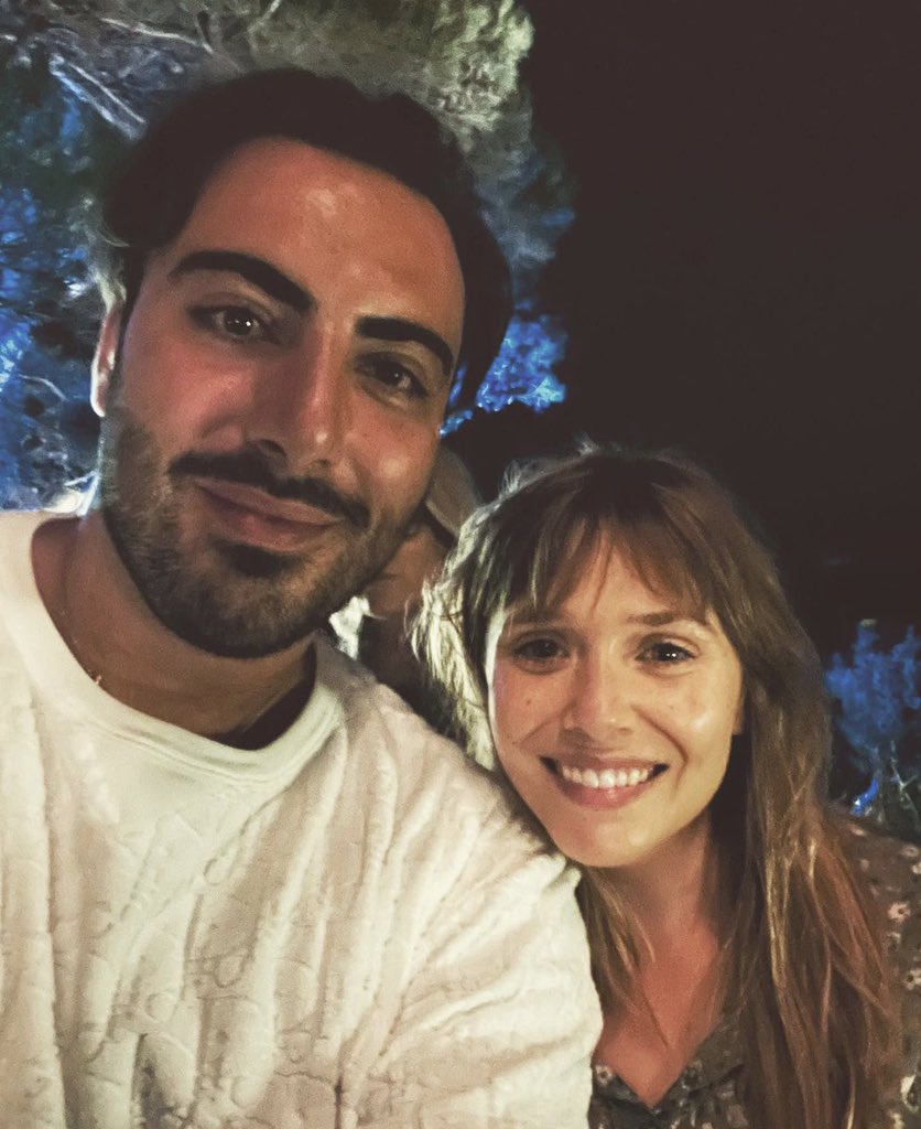 eolsenarchive's tweet image. elizabeth olsen with a fan in italy yesterday