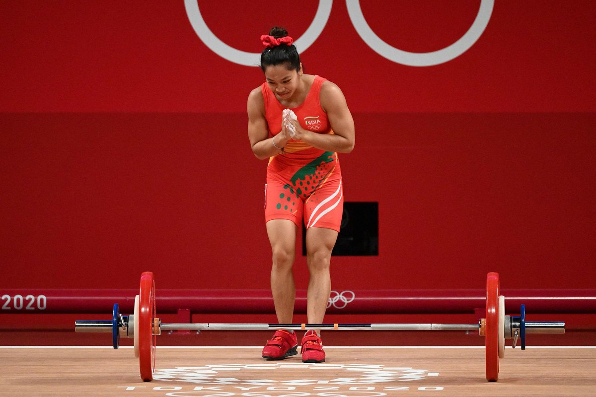 DineshKarthik's tweet photo. The first one is here! 
Congratulations @mirabai_chanu for winning a silver medal 🥈 in weightlifting for India.
Proud moment!

#Tokyo2020 https://t.co/MhSeAtnvDS