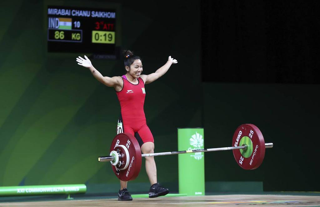 PriyankaJShukla's tweet photo. Just 12 year old #MirabaiChanu could easily carry huge bundle of firewood which her brother couldn’t even pick up. 

And she proves herself yet again- wins India's 1st medal (silver) in  Weightlifting in Women's 49kg category &amp; opens nation’s tally in #Olympics https://t.co/xDpSZXr6OS