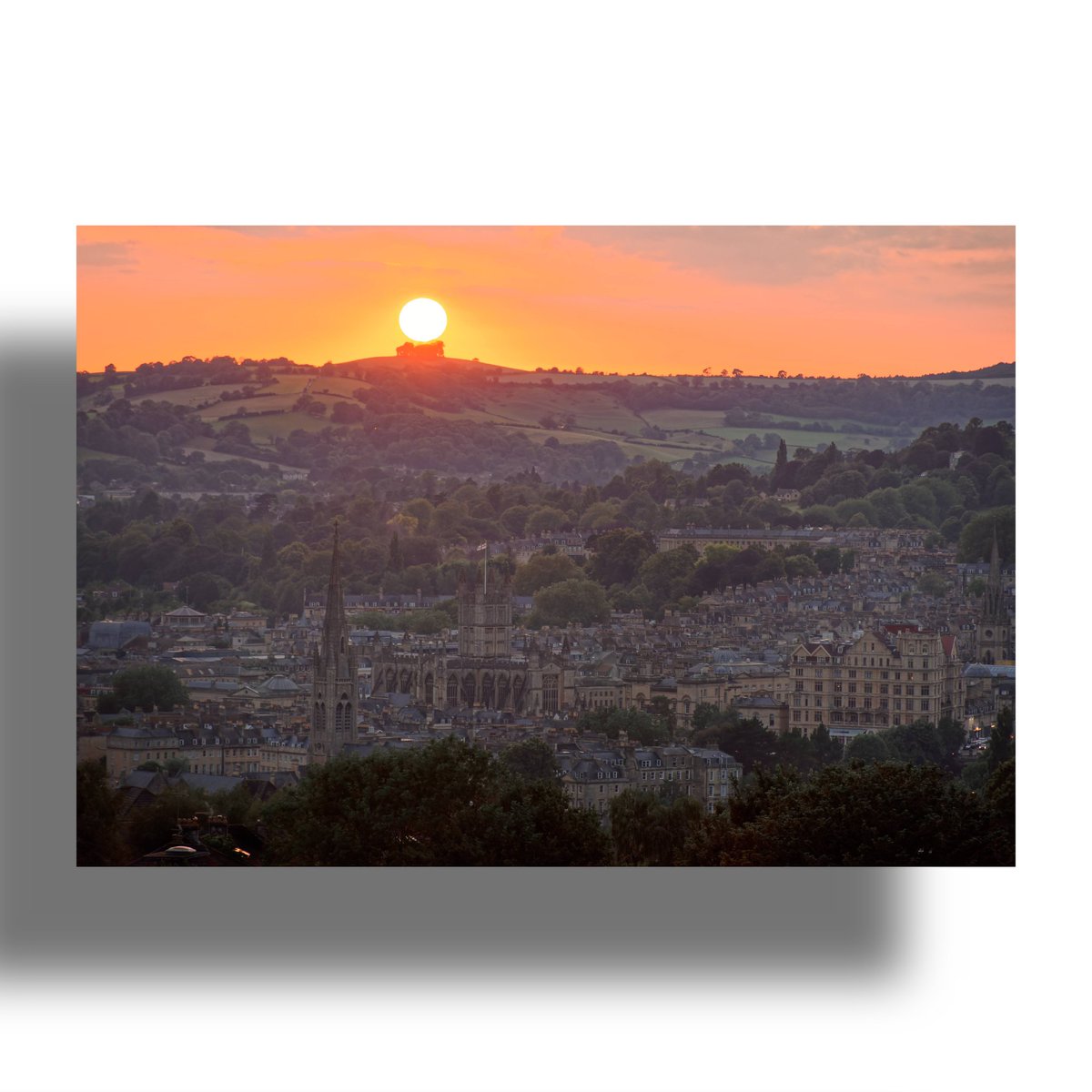 'Roundhill has its hat on'

The sun 🌞 can be seen setting behind Kelston Roundhill with the city of Bath below having baked in several days of extreme sun 🔆
.
.
#ThePhotoHour <a href="/StormHour/">#StormHour</a> <a href="/bathabbey/">Bath Abbey</a> #visitbath #photooftheday #bathuk #royalcrescent #sunset #HeatWave2021