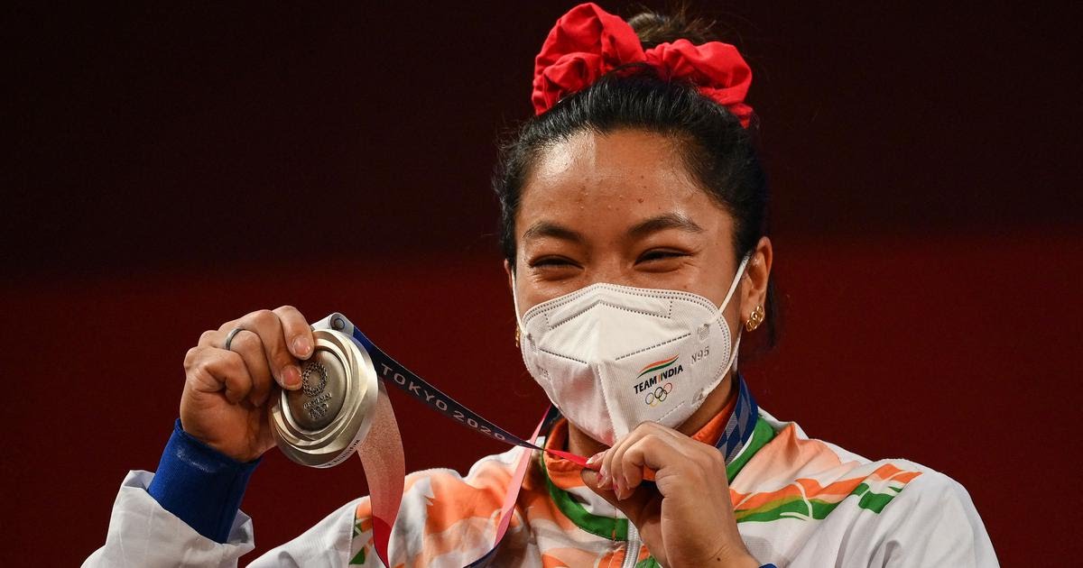 rayonmag's tweet photo. INCREDIBLE: #MirabaiChanu wins a silver in women's 49kg weightlifting at the Tokyo Olympics, making thousands of Indians proud and a handful of North Indian Bollywood actors ready to audition to play her in the movie that someone will eventually make on her. https://t.co/smOaDCYZX8