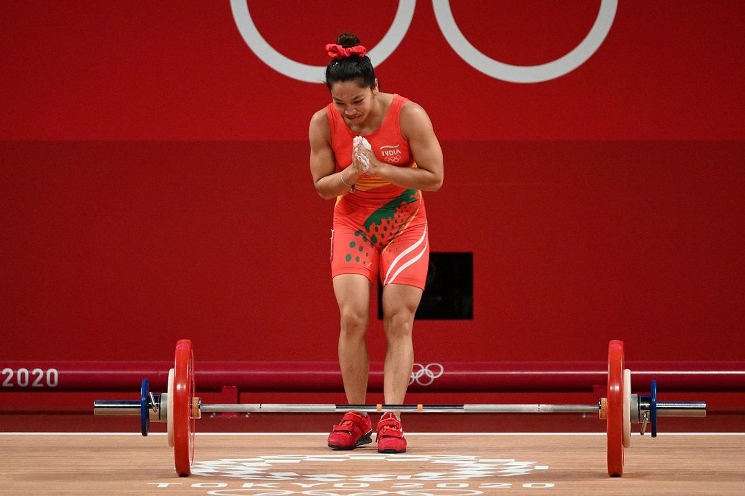 Mohanlal's tweet photo. And here comes India with our very first medal at the Tokyo Olympics 2020! Proud of @mirabai_chanu who secured the silver medal for Weightlifting. Cheers to this moment of triumph! 🇮🇳

#Cheer4India #Tokyo2020 https://t.co/hCc5L7xFyC