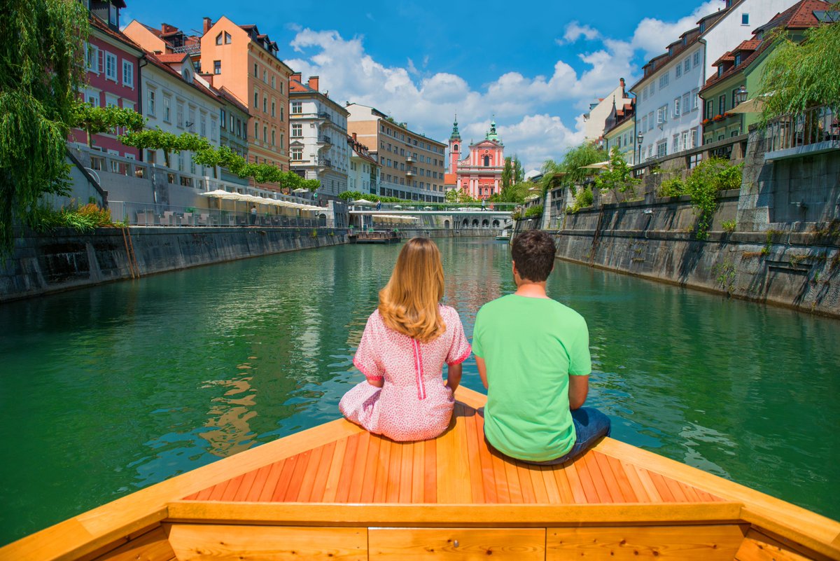 LJUBLJANA - a unique way to see and explore #Slovenia's capital #Ljubljana is to go on a tourist boat ride along the #Ljubljanica river. (photo: Mankica Kranjec, Nea Culpa #photography) #ifeelsLOVEnia #travel All you need to know to visit Ljubljana: travelslovenia.org/ljubljana/