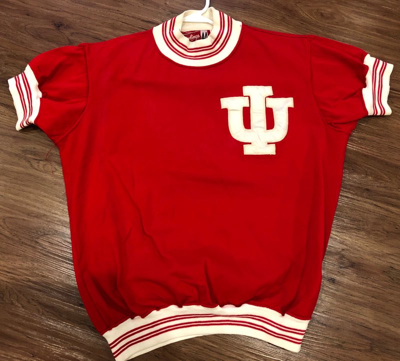 IUArtifacts's tweet photo. In addition to the jerseys from the Watson era, three different styles of warm-up jackets/shirts were used that season: the traditional pitchfork, the script “Hoosiers” style shirt, and a jacket with vertical “Indiana” and white lapels that was also from the previous season. https://t.co/gZpkBpvisx
