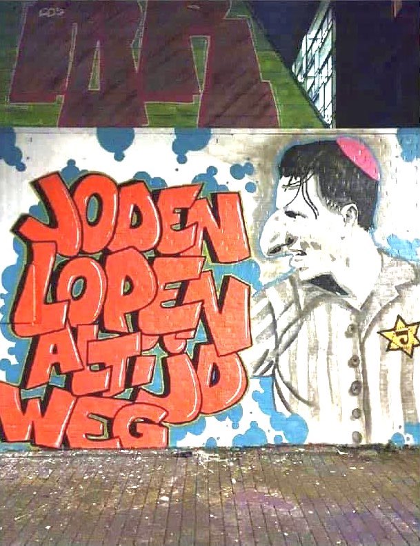 HHooligan's tweet image. Feyenoord supporters make anti-Semitic graffiti of Berghuis after the switch to arch-rival Ajax.  with the text jews always run away.