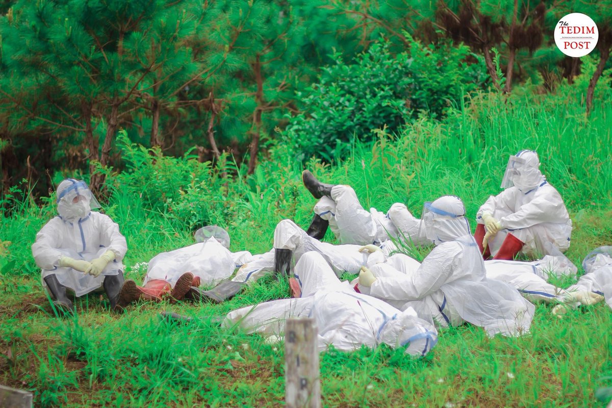 Photo of the Day 

Volunteers in PPE took some rest at the cemetery ground after burying two bodies along with congregations by the help of pastors at Lwaibual, Tedim, Chin State. 📸 @thetedimpostofficial. 

#WhatsHappeningInMyanmar #COVID19 #July25Coup