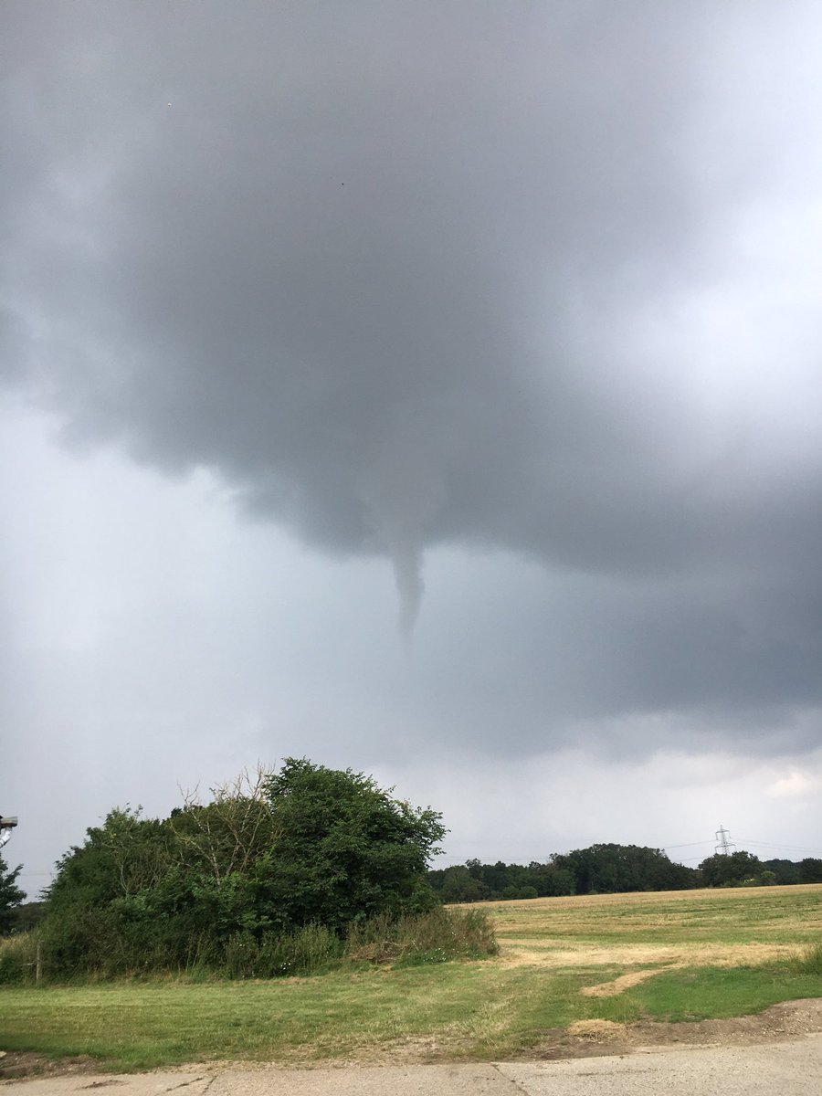 Funnel cloud near Terling this afternoon. <a href="/EssexWeather/">Essex Weather Centre</a> <a href="/convectivewx/">Convective Weather</a> <a href="/TorroUK/">TORRO (Tornado & Storm Research Organisation)</a> <a href="/danholley_/">Dan Holley</a> <a href="/bbcweather/">BBC Weather</a>