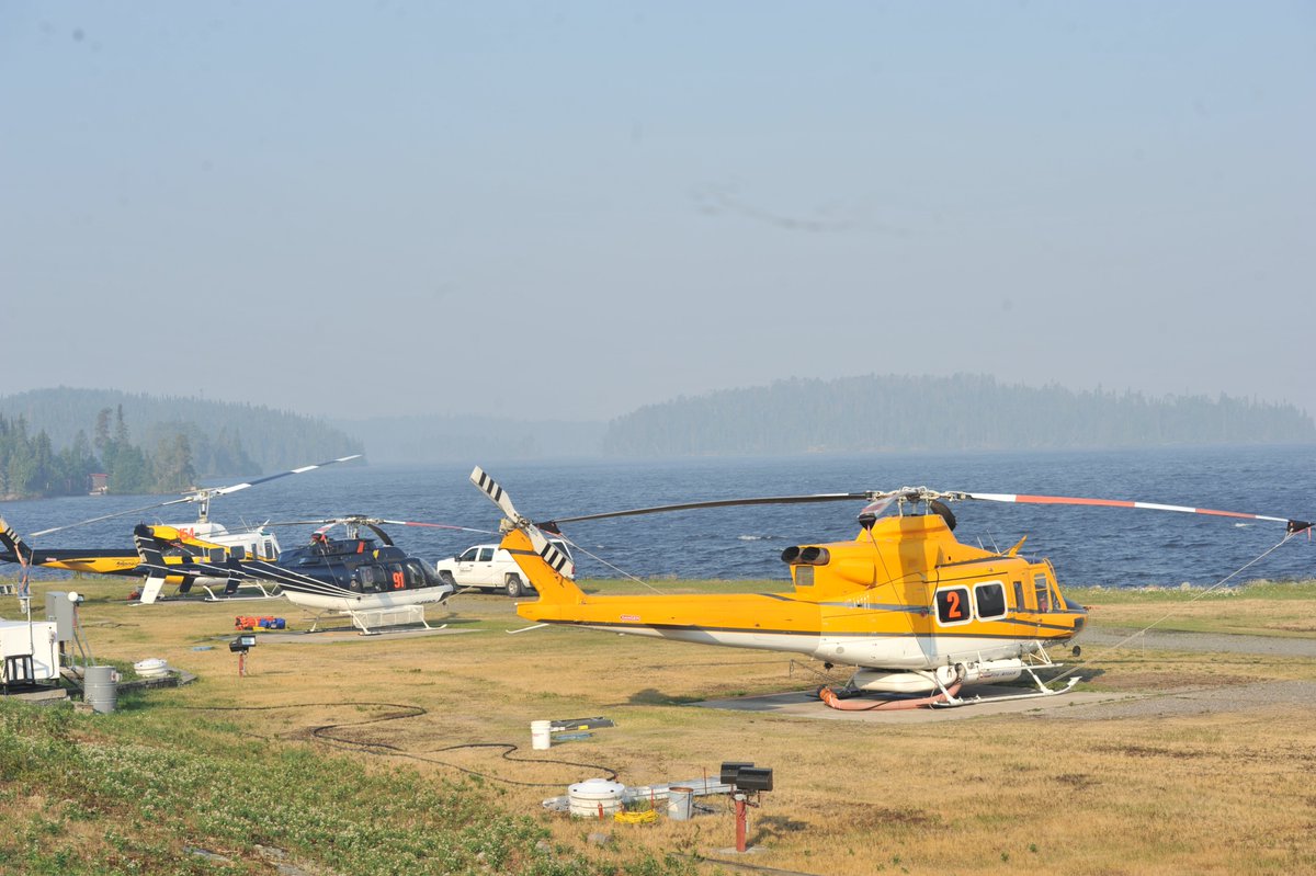 ONforestfires's tweet photo. Two wildland fires ranging 12-15 kilometres to the north and south of North Spirit Lake First Nation are now #BeingHeld by Ontario #FireRanger crews, with support from helicopters bucketing water. Find out more about the fire situation in Ontario at: https://t.co/XPnoZFTS24 https://t.co/8N96GCf9te