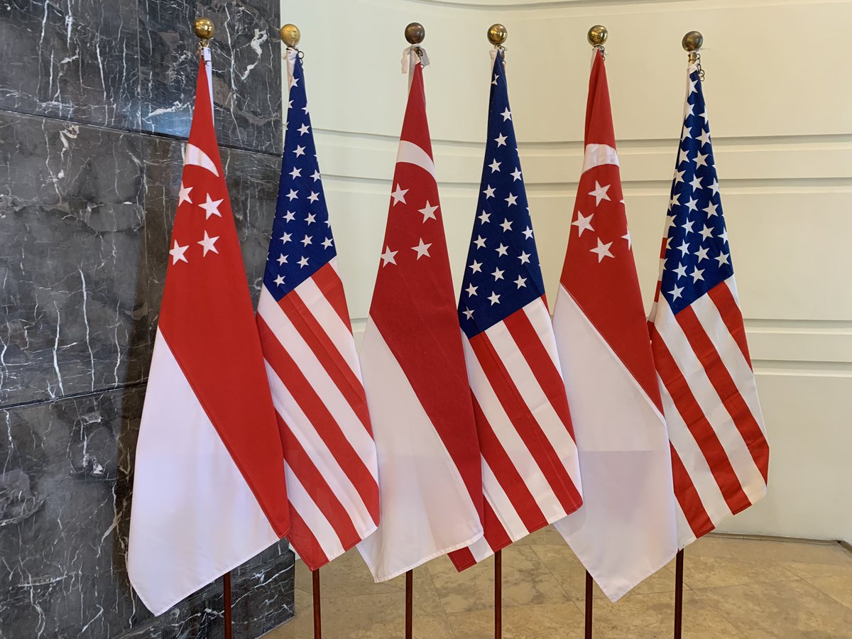 graham_euan's tweet photo. The flags are already up in the Fullerton Hotel and SECDEF is on the ground. https://t.co/XFwkCm3Eo4
