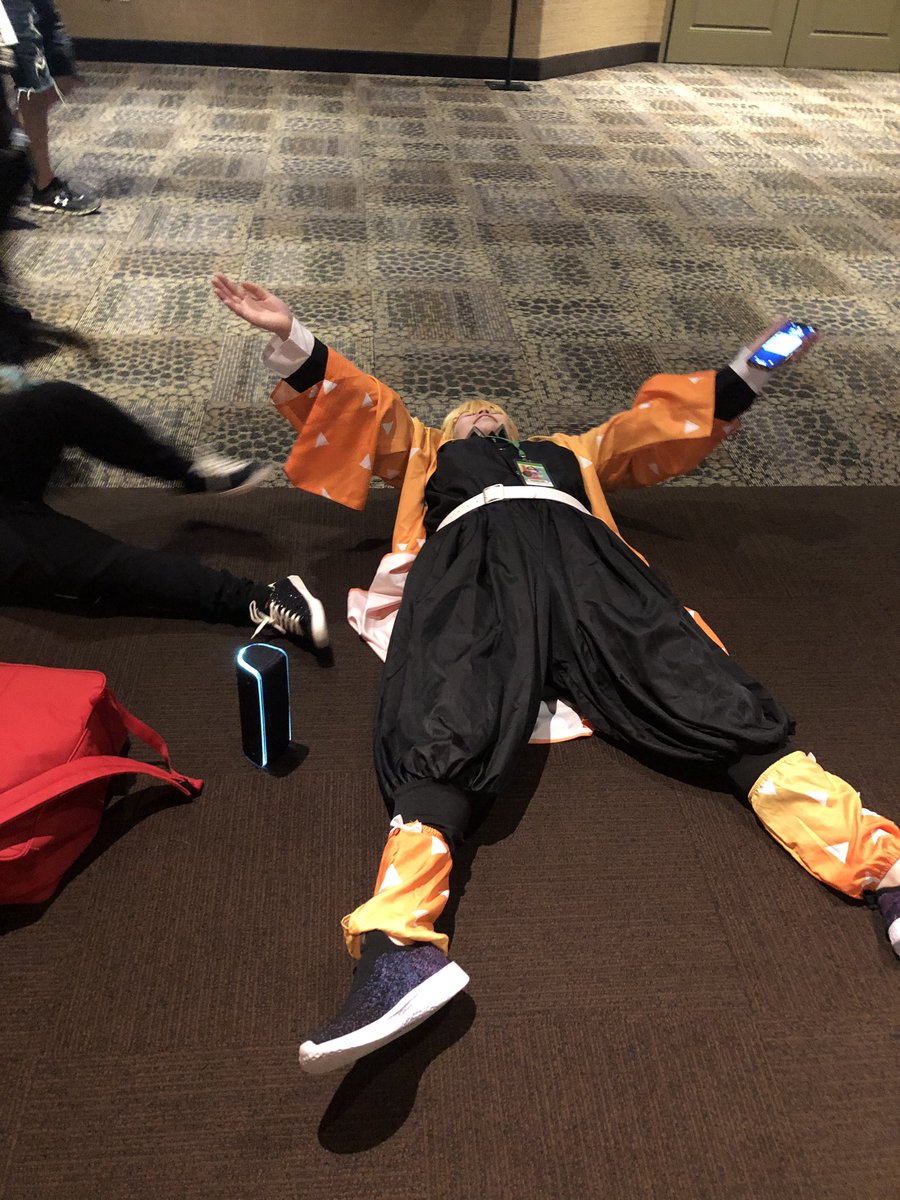 FijiCorgi's tweet photo. We Dead XD @Fell_Dragon_ #cosplay #furry #fursuit #zenitsu #DemonSlayer #colossalcon2021 #zenitsucosplay https://t.co/IU4lbAC64N