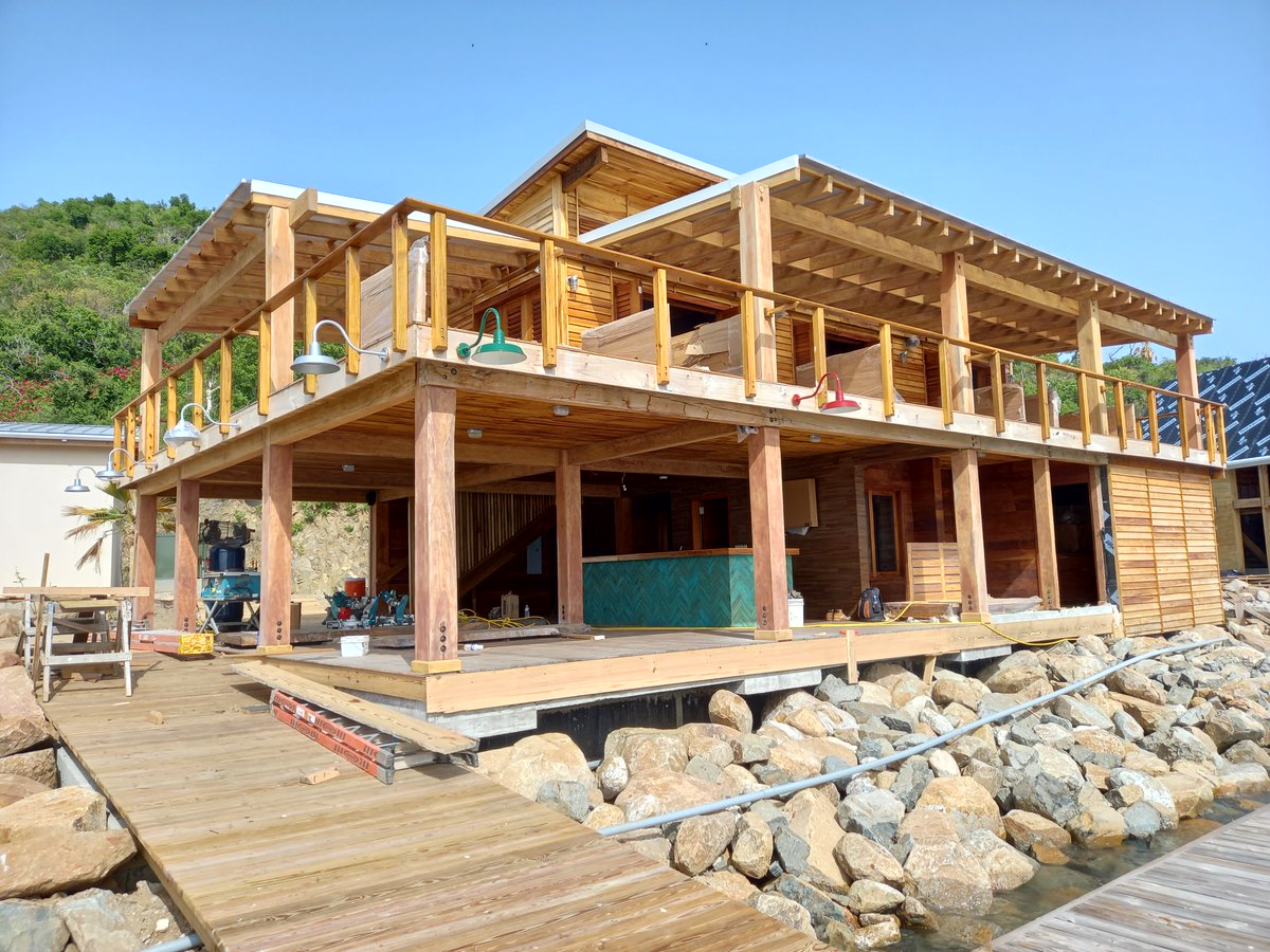 BITTERENDYC's tweet photo. The new Quarterdeck Marina building is coming along nicely, don't you think? Sure to be a beacon for sailors and boaters entering North Sound. Stay tuned next week for some interior images #MondayMotivation #MondayInspiration #Construction #Progress #BringBackBitterEnd #BEYC #BVI https://t.co/joqXkrXcA7