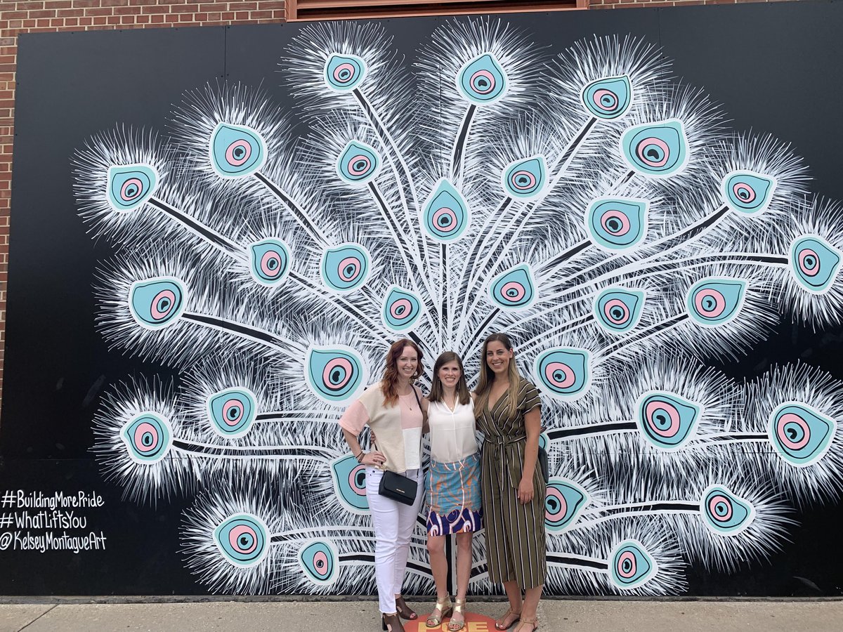 KaneCommGroup's tweet photo. Good morning from the Kane team at the new @kelsmontagueart mural at the Wisconsin Center District! How will you be #BuildingMorePride this week? #MilwaukeeArt #KelseyMontague #WhatLiftsYou https://t.co/sGCRSH05fz