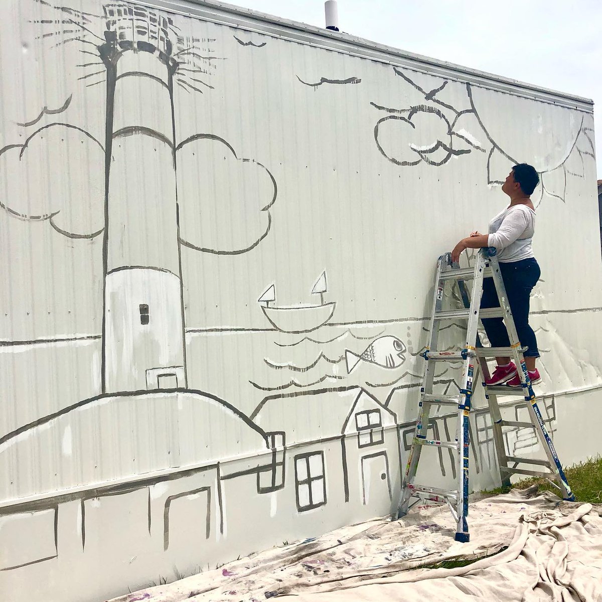 acpublicarts's tweet photo. Happy #MuralMonday from this mural in progress! Heather Deegan Hires will be working with our team from the LIT program to paint this children’s drawing of the Absecon Lighthouse all week!

#acaf #acnj #mural #muralart #artsinyourcommunity #doac #whynotac #respectac #njarts https://t.co/zSwDH9r8Qz