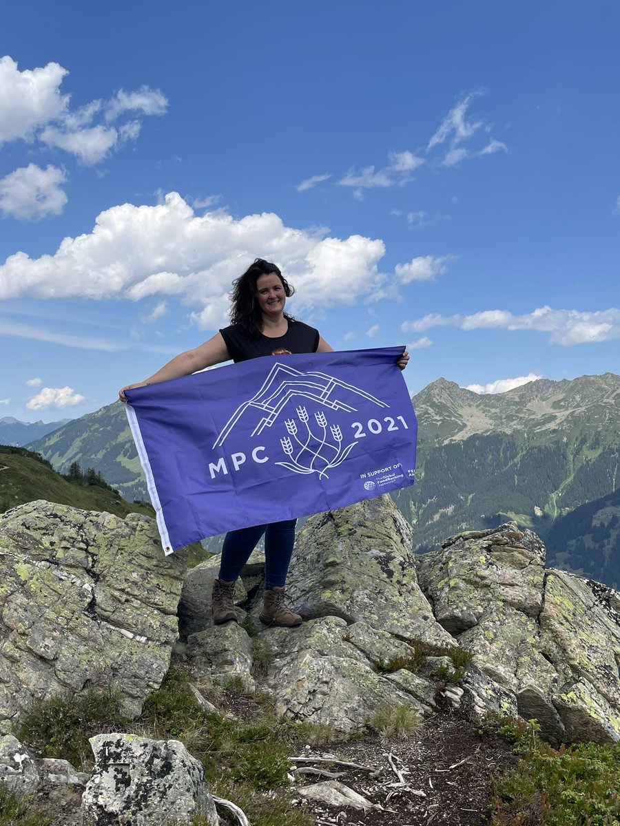 Waving my MPC flag up in the mountains! Such a happy feeling!! Thanks to MPC I discovered my love for mountains. #peakerforlife #myoeakchallenge #happyplace