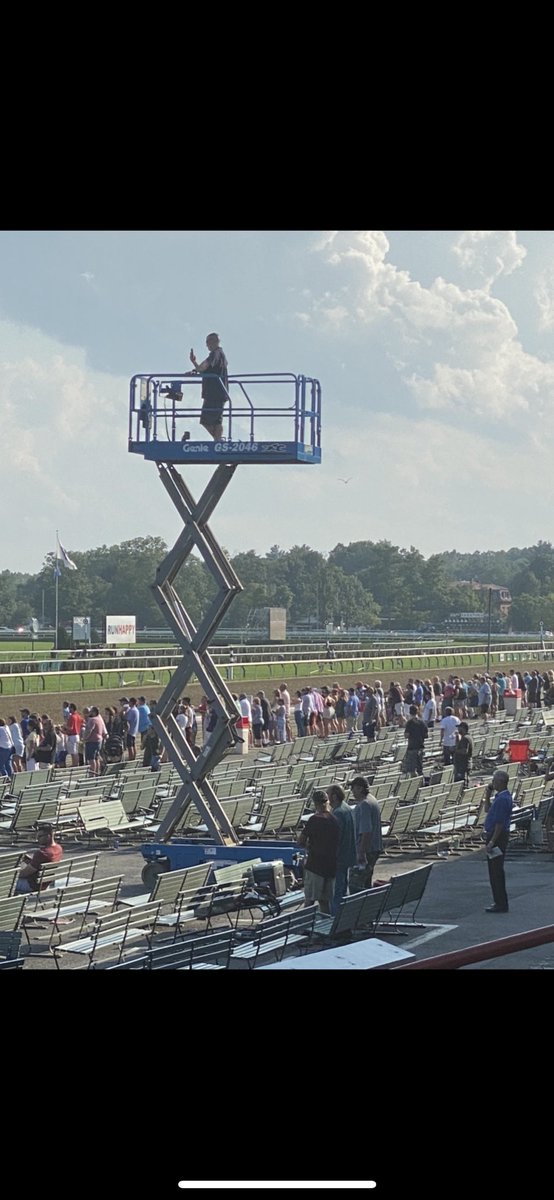 Guy with the best view of the late races at Saratoga - the guy who stole the scissor lift (note security on walkie talkie) @TheBigAStabile @andyserling @RealGregWolf @acacia_courtney @MaggieWolfndale