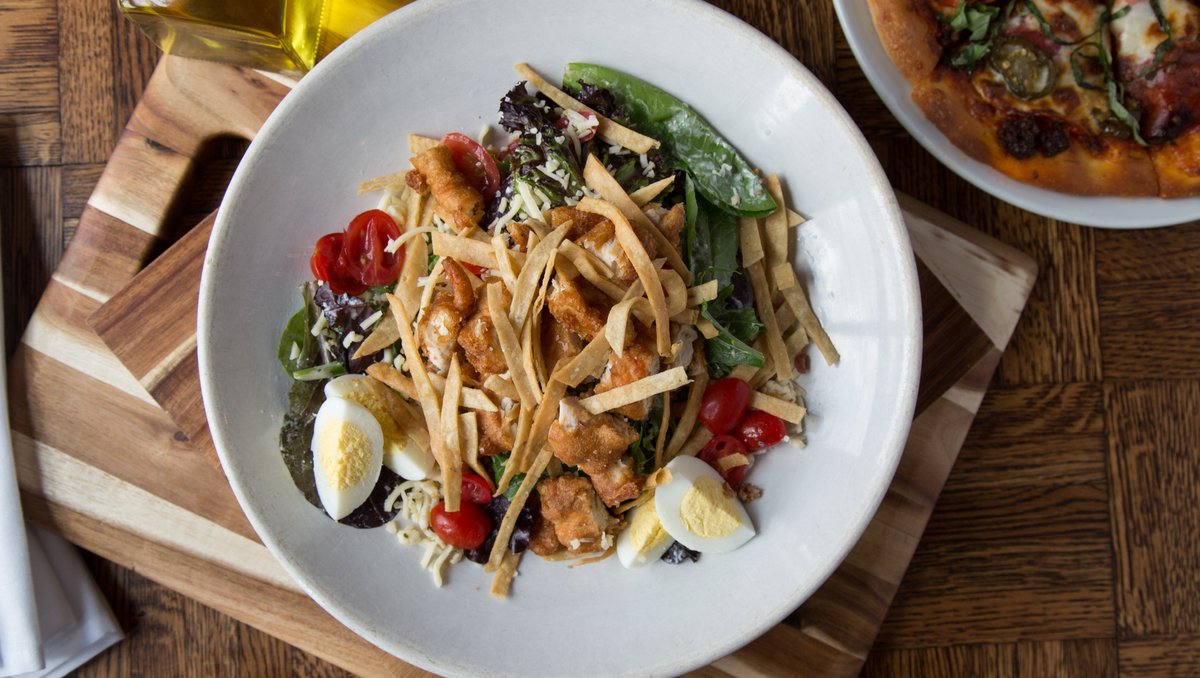 A big and bountiful salad is just what you need to fuel up for the week! 

Our Boulevard Chicken Salad is made with mixed greens, bacon, cherry tomatoes, egg, pepper jack cheese, tortilla strips, and Boulevard beer-battered chicken, all topped with Asiago peppercorn dressing.