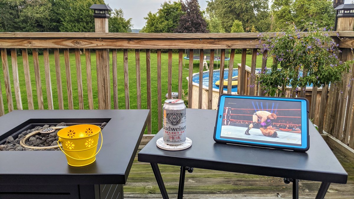 My son asked if he could go swimming. I set myself up so I could watch him, and still enjoy #WWERaw and a cold #BudSelect55.   

He jumped in once, and said "It's cold, I'm all done..."

But, I think I may stay out here. This is a very pleasant way to enjoy some wrestling!