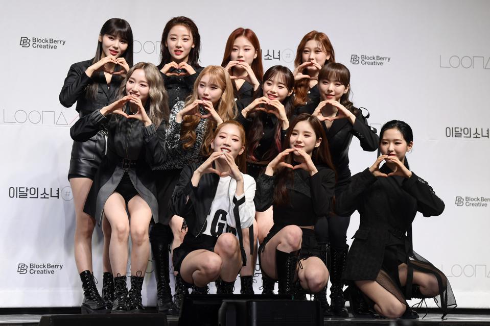 Forbes's tweet photo. Loona, TXT And BTS’s Suga Have Made 2021 A Huge Year For Koreans Scoring Their First U.S. Radio Hits https://t.co/Qx1OVdOqGh https://t.co/KrSpVFINex