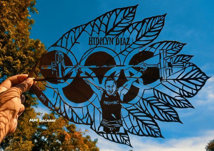 Rappler on Twitter: "FILIPINO PRIDE 🇵🇭🏋️♀️ LOOK: MM Dacanay, an artist who hails from Biñan, Laguna, creates this intricate leaf art to pay tribute to Hidilyn Diaz for winning the Philippines' first