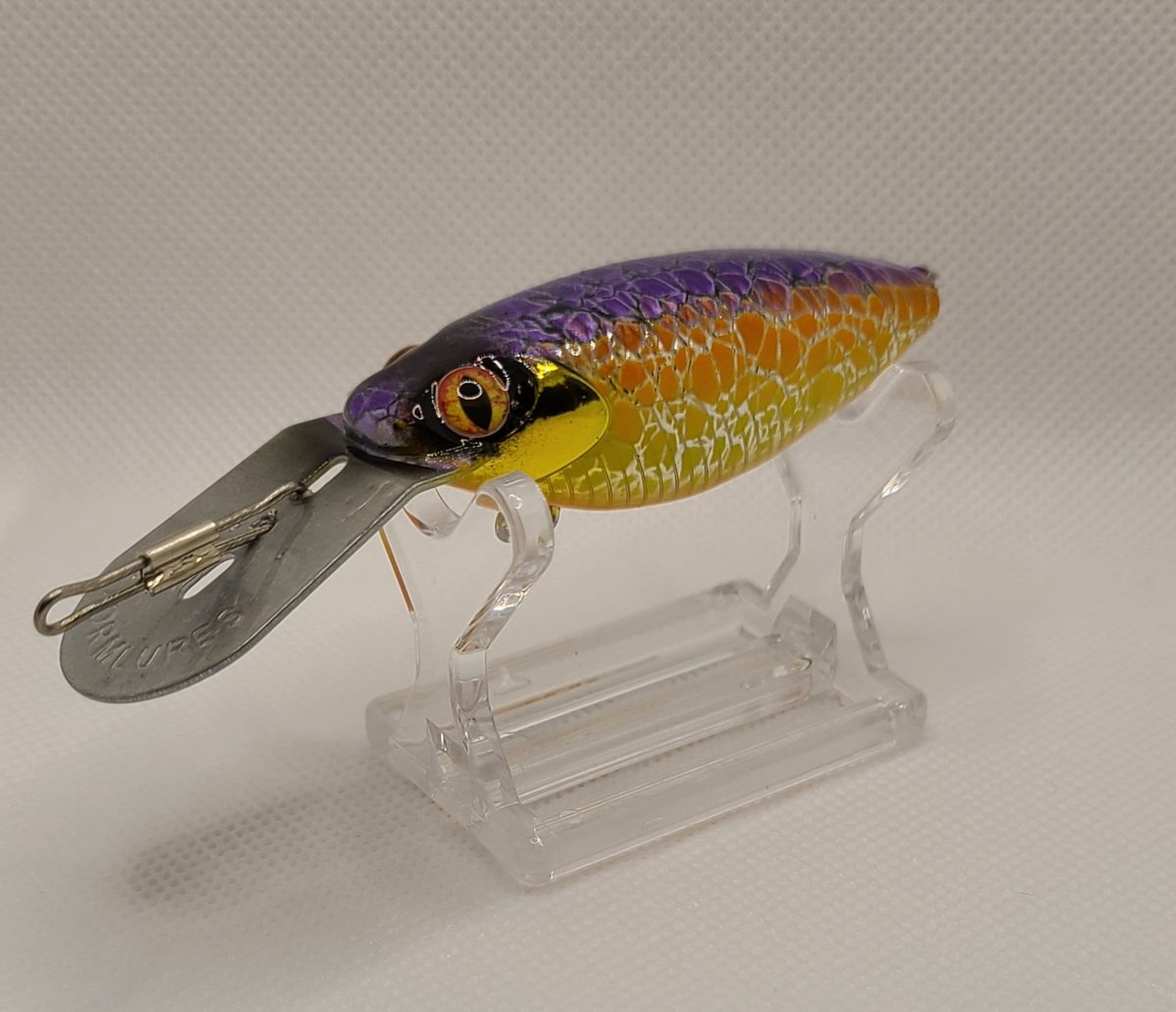 LurehouseCustom's tweet photo. Just finishing up an order and the Rattle Tot in Tequila Sunrise pattern looks pretty cool! https://t.co/kkO7BV4rn8