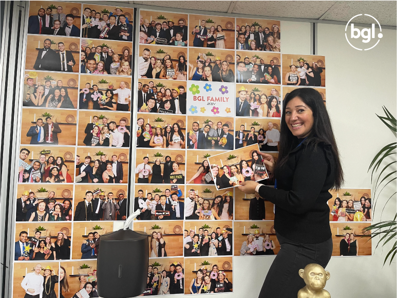 BGLcorp's tweet photo. @DanniTVersace creating an amazing photomural to welcome our BGL family back to the office 🥰 https://t.co/SXppB8P2OU