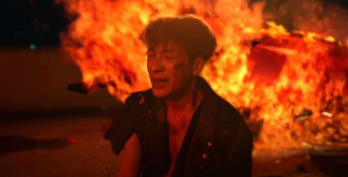 allkpop's tweet photo. GOT7's Jackson cries next to flames in 'Drive You Home' MV teaser
https://t.co/aQMU8yqKQw https://t.co/JbvCY6M4F2