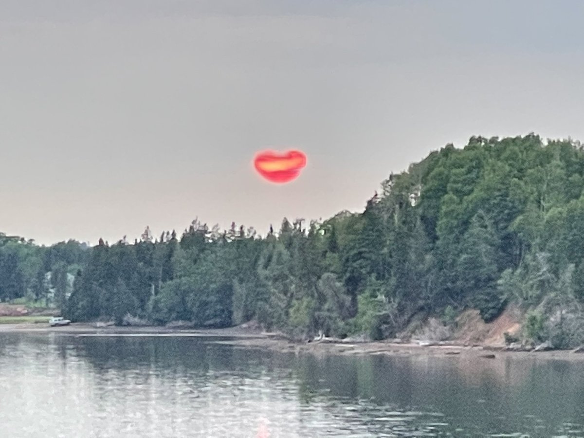 beach_footprint's tweet photo. The strangest (Star Wars Death Star) sunset 26-07-2021 ever seen on the Brudenell River #PEI. Unfiltered #iPhone 12 photos. No doubt caused by western Canada smoke from wildfires. https://t.co/WKrG5BdTwJ
