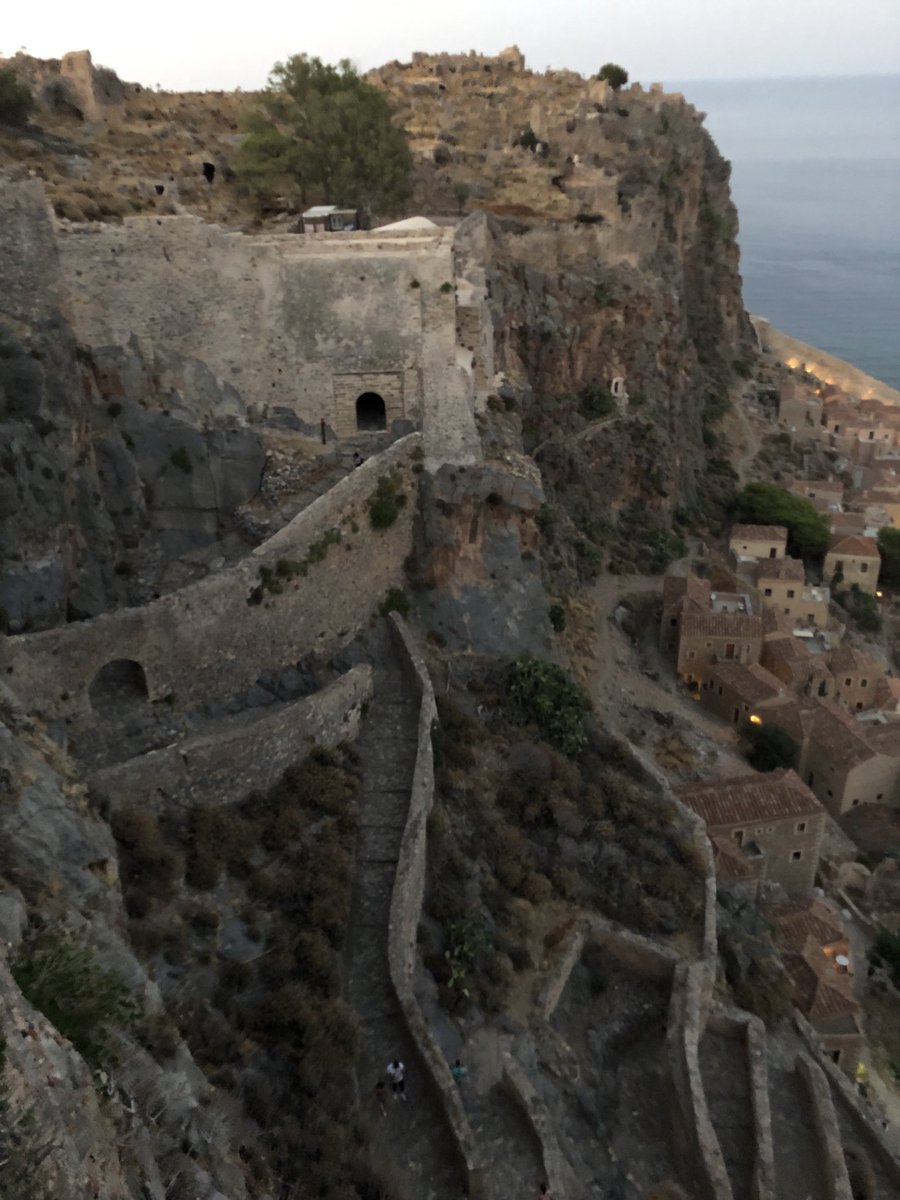 Monemvasia, Laconia, Greece, 90 min away from Sparta. -Founded 583 AD. -Check the fortified corridor connecting upper and lower medieval fortresses. Reading history vs walking through history!