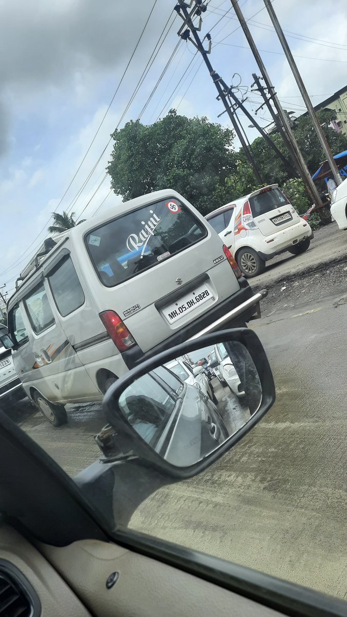 noaaale's tweet photo. Hey @MumbaiPolice thought of informing you of a Nazi car roaming in Dombivli, right outside of manpada crime branch https://t.co/2FdtZRnDIq