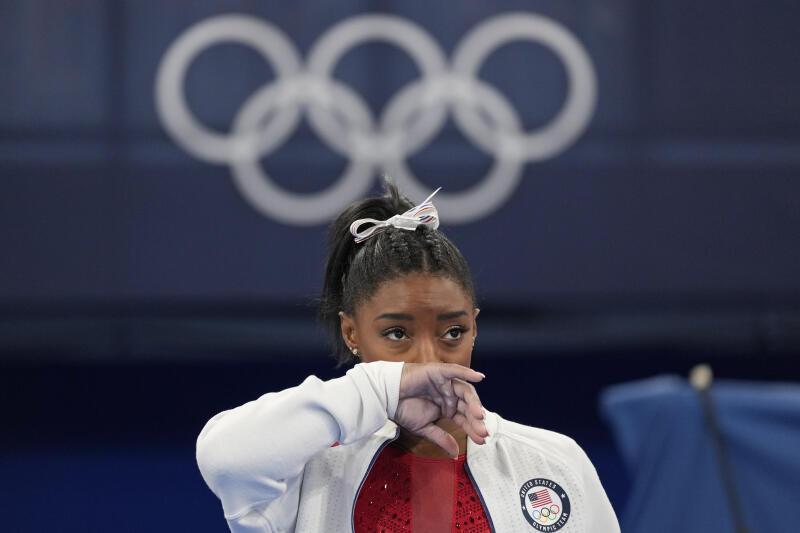 Reigning Olympic gymnastics champion Simone Biles is out of the team finals