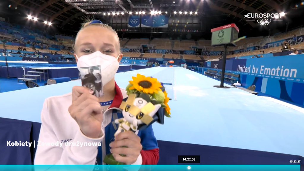 Listunova was holding up a photo of her coach Gennedy Petrovichev - he passed away in October 2020