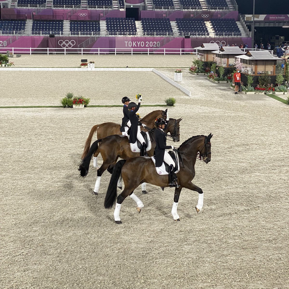 FEI_Global's tweet photo. There’s they go….they they go again!! 

What a beautiful sight of Team Germany on their lap of honour 😍 🇩🇪 

#Tokyo2020 #EquestrianDressage https://t.co/at7qaTXD0b