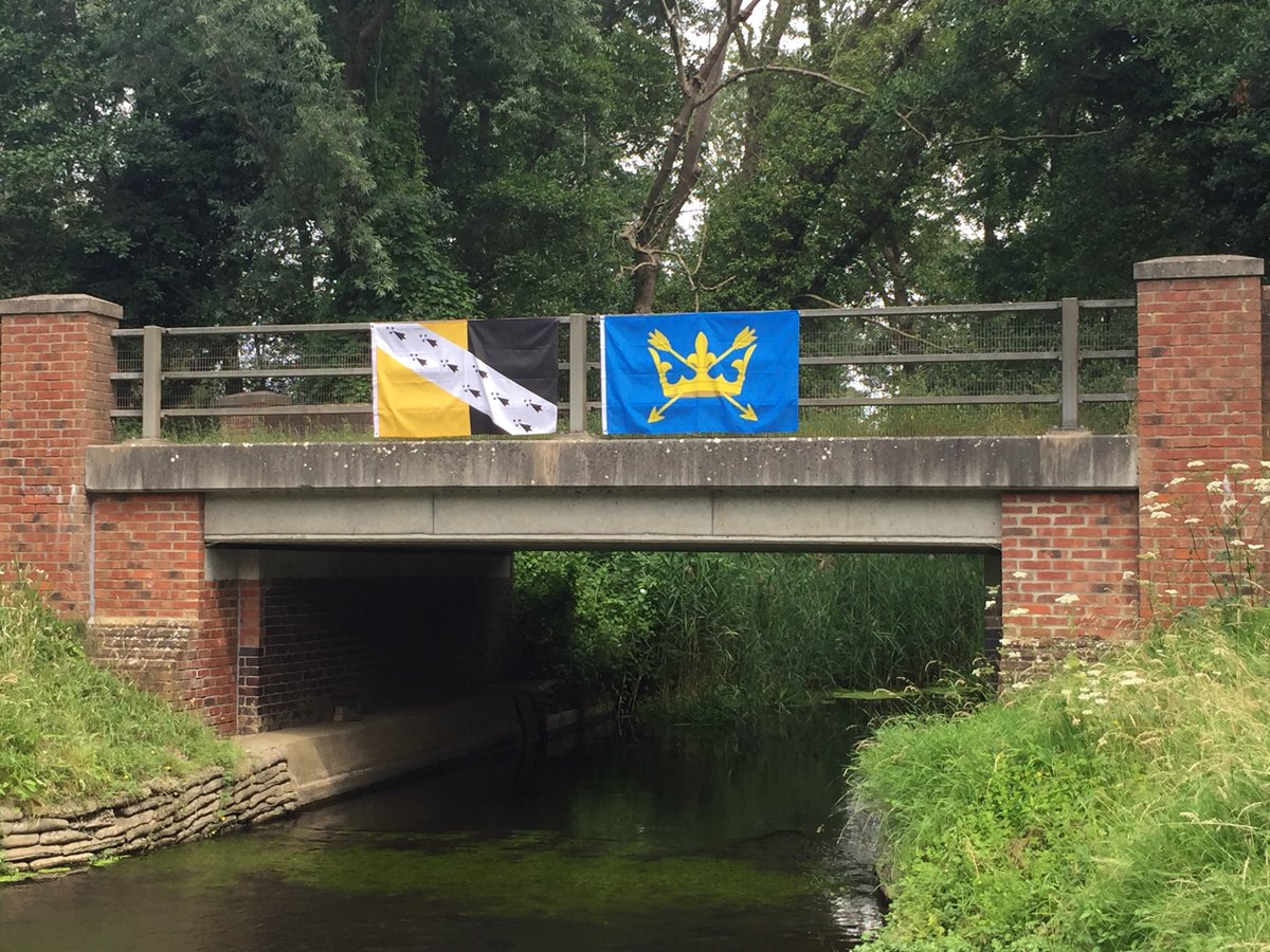 For Norfolk Day, we wanted to share a photo capturing the Norfolk and Suffolk flags on County Bridge between Thetford and Euston. The bridge spans the Little Ouse. At this point, the river forms the Norfolk-Suffolk border. #NorfolkDay #Norfolkflag #Suffolkflag