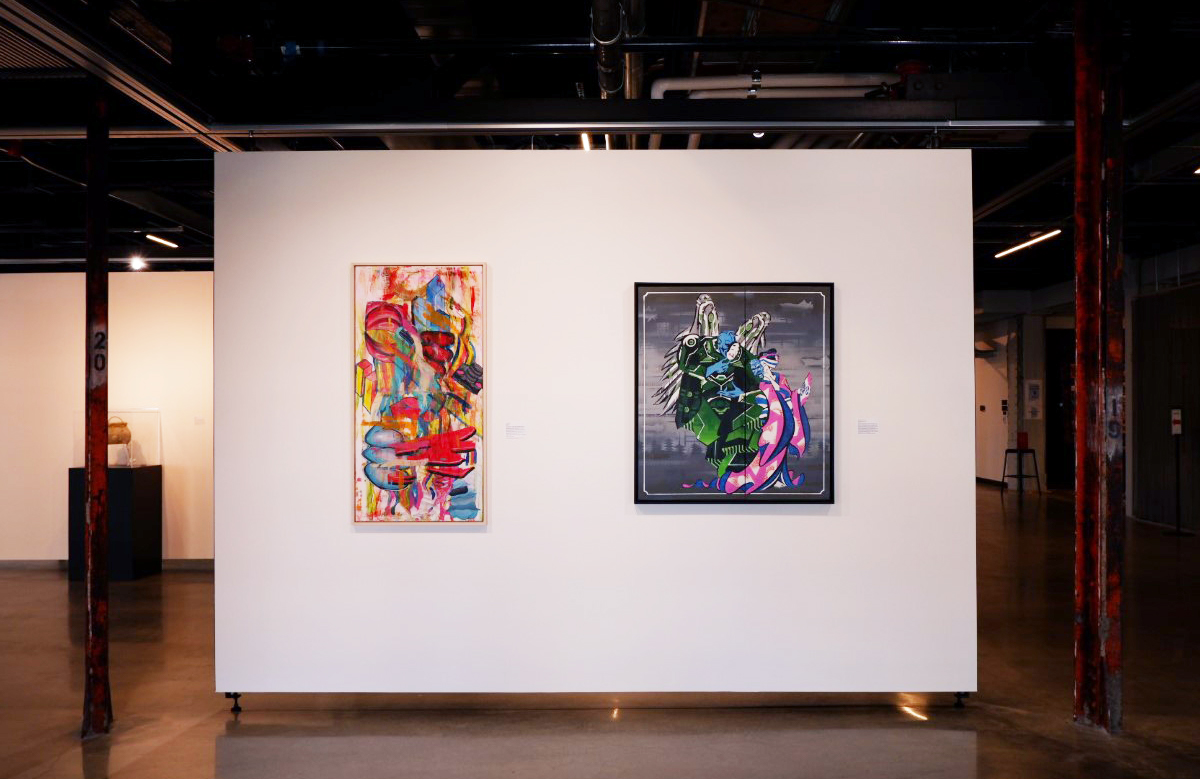 Two artworks displayed on a gallery wall at the ARTS at King Street Station.