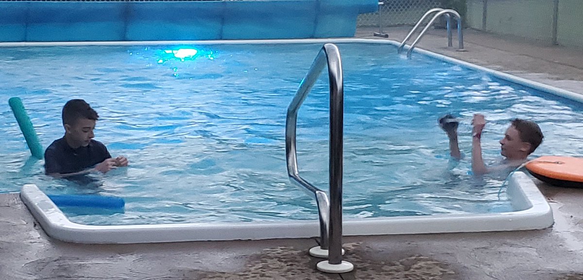 HopeEatonSmith's tweet image. When your cousin flies in for the week... you go night swimming in the rain #pooltime #stormsover #nightswimming