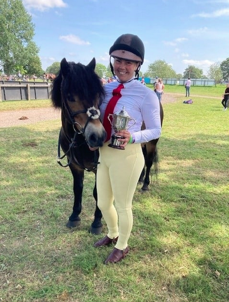 EPS_exmoorpony's tweet photo. Thank you to Ann Nicholls for sending through this fabulous photo of Davinia Johnson and Stowbrook Red Kite receiving their trophy donated by the Wallace family for being Best of Breed at Olympia 2019. https://t.co/6MWnJtuBHX