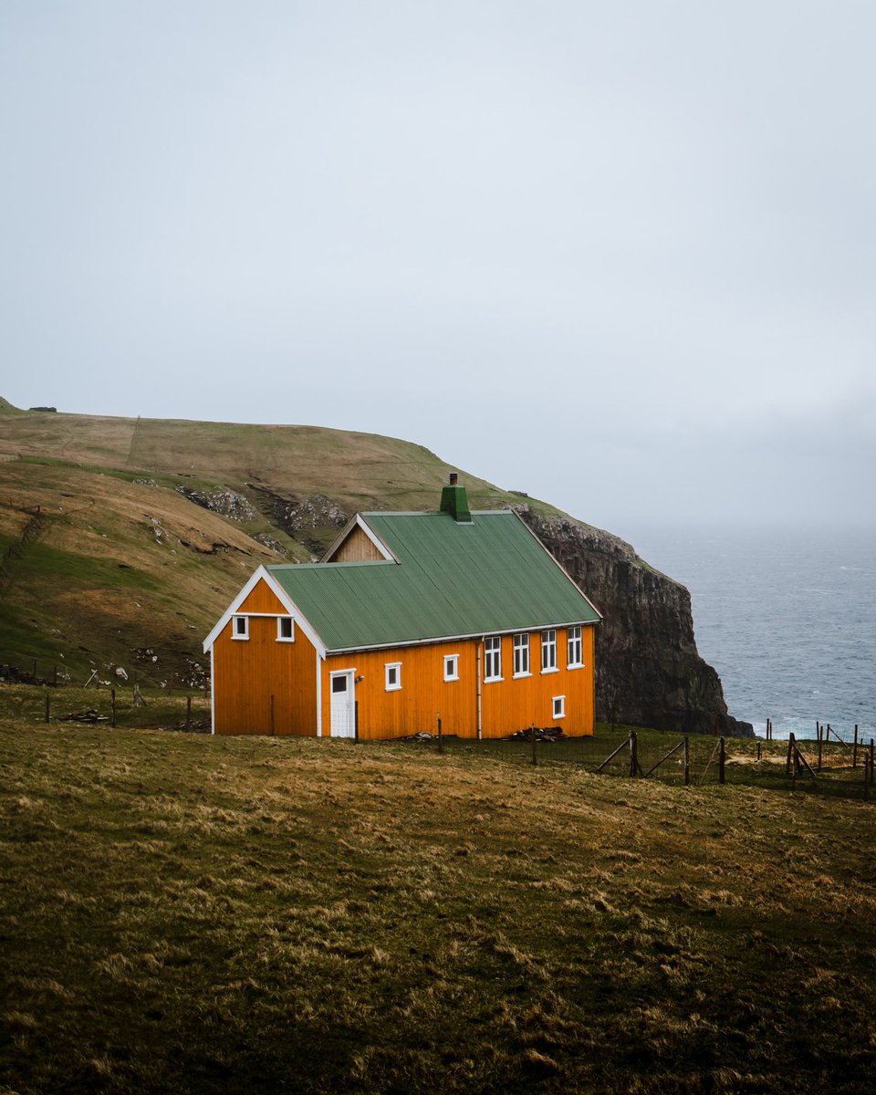 jonmhayward's tweet photo. House goals on the Faroe Islands. I wonder how often the owners have to paint this house? @VisitFaroe #faroeislands https://t.co/H6ajbJ4A0d