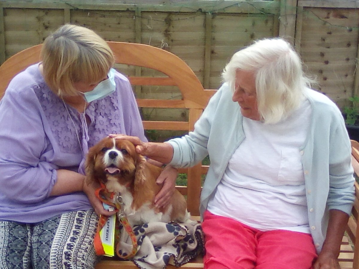 Yesterday we had a lovely visit from Therapy dog Agnes and her owner Margaret. Residents love meeting Agnes, and Agnes loves having lots of ear scratches and compliments! 🐶🐾
Here are Margaret, Agnes and Joan sitting outside in the sunshine! 
#qmecare #petsastherapy #therapydog