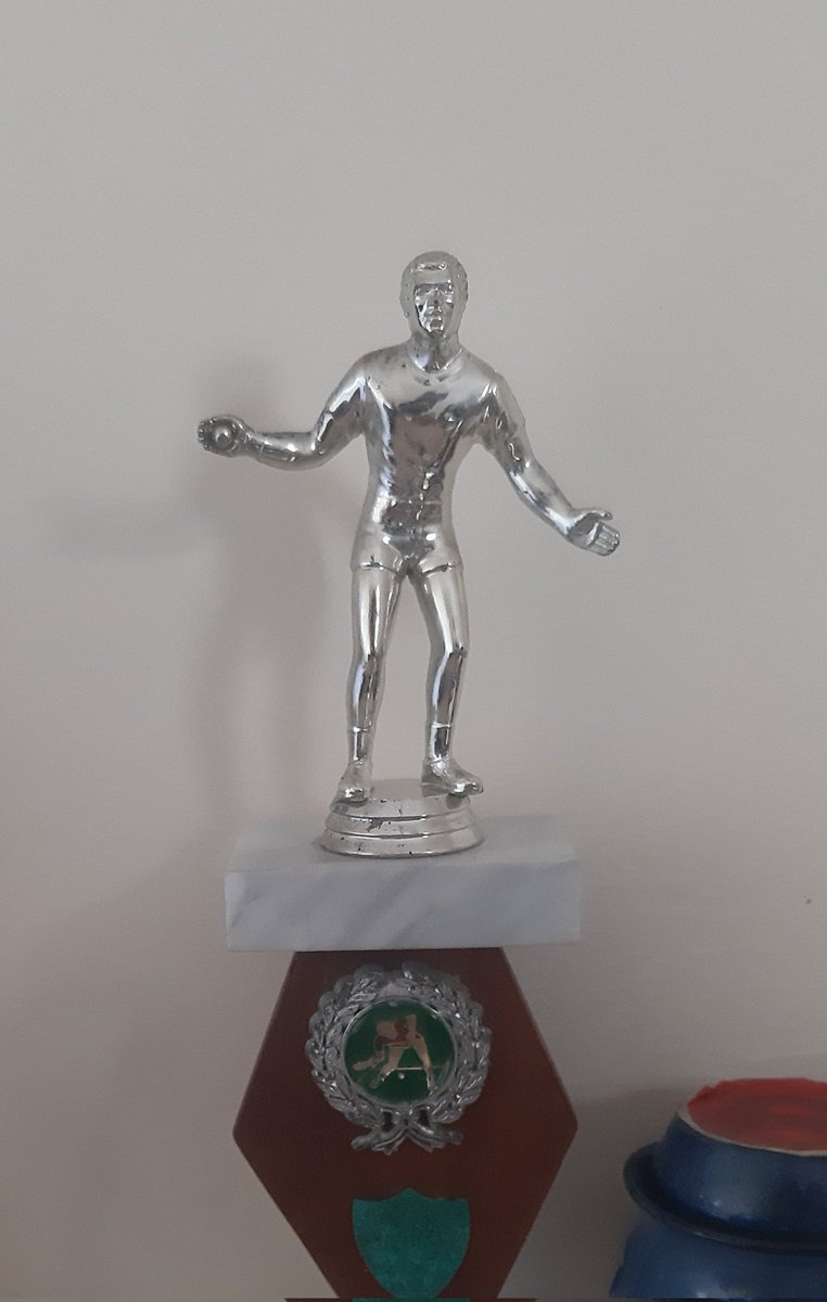 When you're not sure what sport they need the trophy for, just play it safe.

A man going 'tada!'