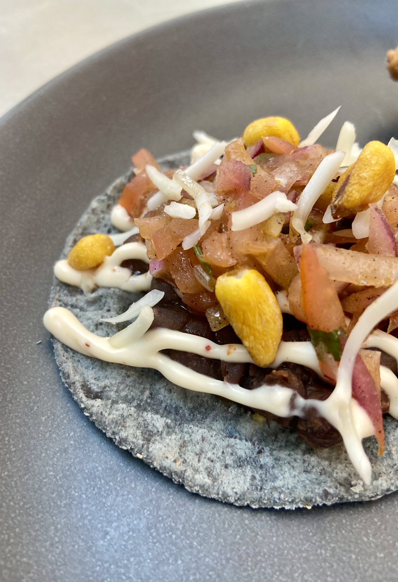 WATD_NQ's tweet photo. It’s getting pretty spicy out there. Come dry off &amp; warm up. These little guys are just ticket - re-fried beans, pico de gallo, lime salt mayo, vegan mozzarella and crunchy corn nuts (ve). https://t.co/3c1TeFLxVE