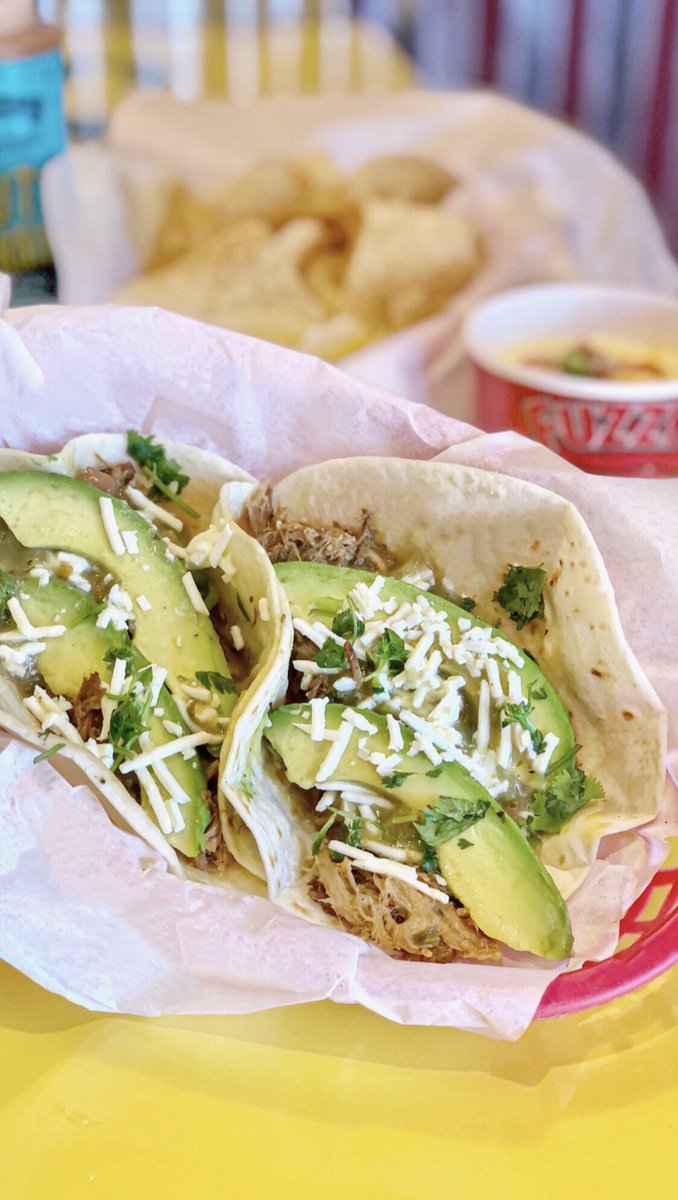 🚨NEW TACO ALERT👉 Get in on the Hatch action with our new Hatch Green Chile Taco. Made with spicy pork or shredded chicken, garlic sauce, avocado slices, feta, cilantro and made-in-house Hatch green chile sauce on a warm flour tortilla for a limited time #fuzzystacoshop #tacos
