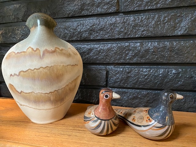 Estate sale season is in full swing and you never know what treasures you will find. We found these great pottery pieces - a Hoffman vase and charming painted birds.