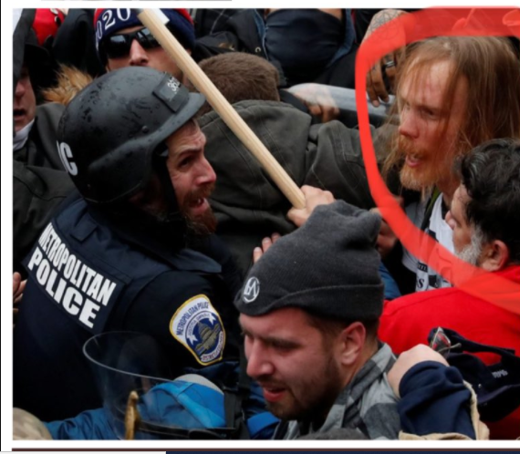 Officer Farone confronted by terrorists, one we labeled #HitlerStalinMaoTshirt (because that's the shirt he was wearing) (from same's Indi. page bio).