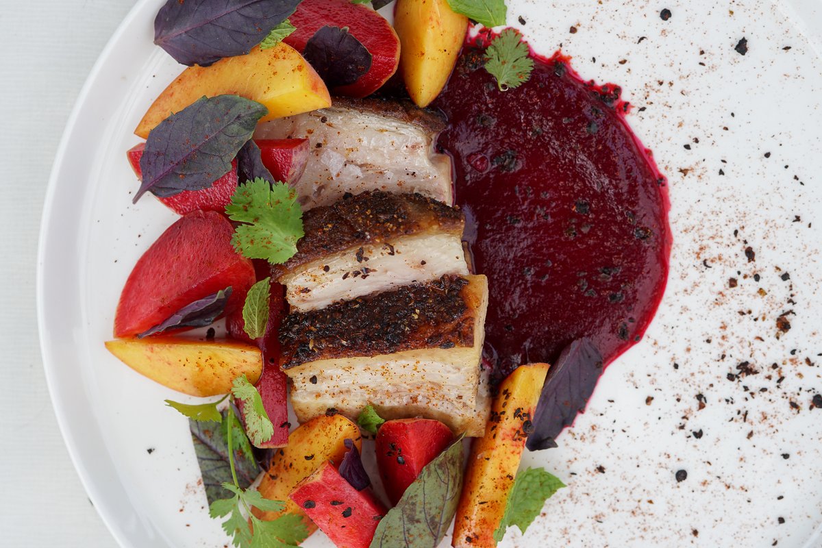 Pork belly chicharon, with cilantro puree, pluots, regier peaches &amp; mint.