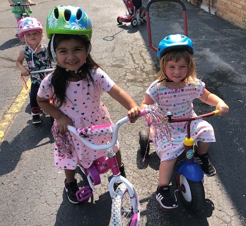 SJVCatholic's tweet photo. Wacky Wheels Wednesday brings out the Big Wheels, the big bikes, and the big smiles! #SJVSHINEs #SJVSummerProgram #SummerFun@SJV https://t.co/oNuw598MqV