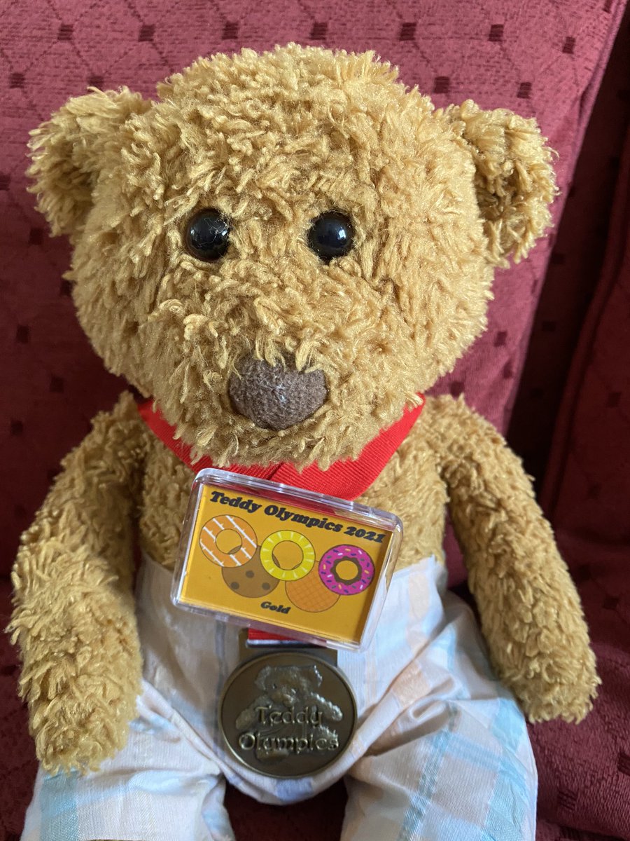 TravelTeddy3's tweet photo. Still proudly wearing my #teddyolympics2021 medal and badge. #Balancin #gold @HeroStuffie I do love our community. https://t.co/tY53mMem64
