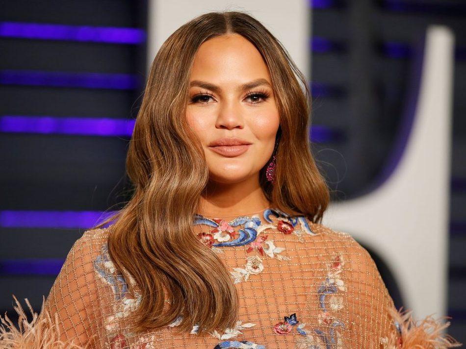 Chrissy Teigen slammed online for adopting purebred puppy