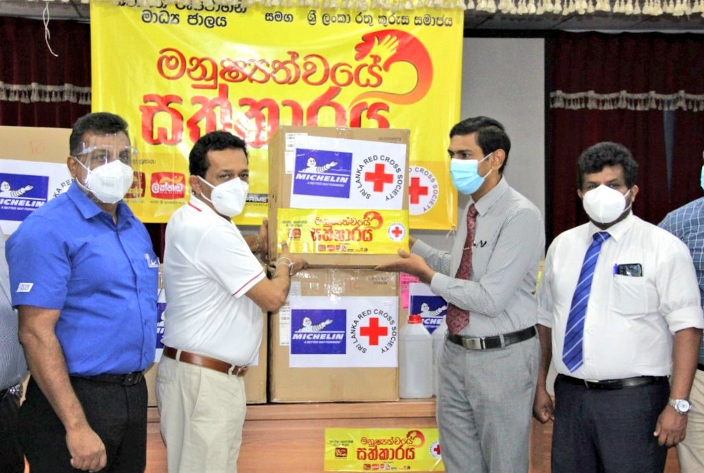 SLRedCross's tweet photo. Aiming to support noble medical staff in their mission to eradicate #COVID19, stocks of personal protective equipment were handed over to the Ratnapura Base Hospital by the SLRCS today in partnership with @Michelin Group and @ITNSriLanka . https://t.co/ViL8IzNb9B