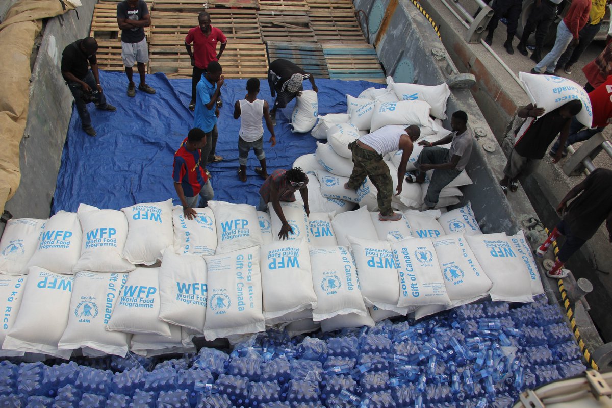 Working loading bags of WFP assistance to a ship at Port-au-Prince Port, Haiti, 2016.